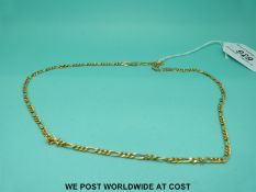 A yellow metal necklace marked 750 (4.