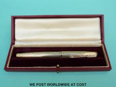 A 9ct gold Parker fountain pen uninked in original case and box marked Presidential Single