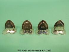 A set of four Sampson Mordan hallmarked silver heart shaped menu holders,