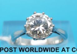 A hallmarked platinum ring set with a round brilliant cut diamond of approximately 1.