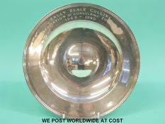 A modern hallmarked silver circular bowl with feature hallmarks,