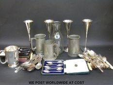 A cased set of six hallmarked silver plated coffee bean spoons, further cased and loose cutlery,