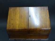 A 19thC mahogany stationery box with fitted interior (29cm tall)