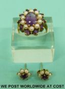 A 9ct gold ring set with amethysts and seed pearls with matching earrings