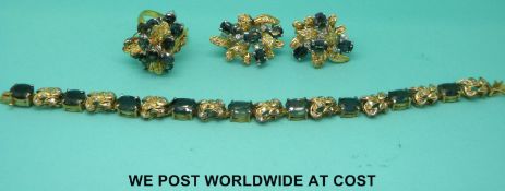 An 18ct gold suite of bespoke jewellery comprising bracelet,