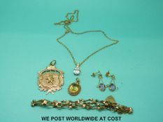A collection of 9ct gold jewellery including chain, fob, bracelet,