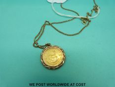 A 1982 1/10 Krugerrand in 9ct gold mount on 9ct gold chain (8.