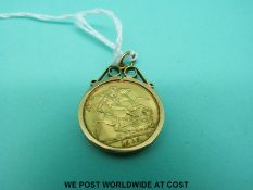 A 1963 gold full sovereign with 9ct gold pendant mount (9.