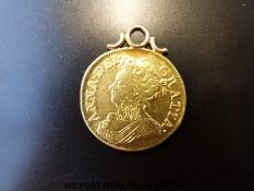 A 1714 guinea on top mount