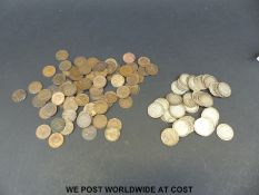 A collection of almost 80 farthings, some with lustre and a quantity of Victorian shillings,