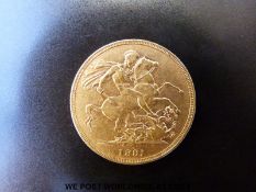 A 1881 gold full sovereign,