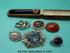 A Victorian yellow metal stick pin in original Bristol box, two Victorian silver brooches,