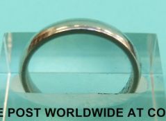 A platinum wedding band (Size K,