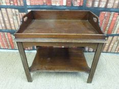 A 19thC probably Georgian mahogany butler's tray on stand with undershelf raised on chamfered