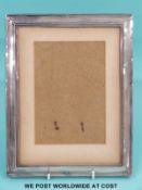 A George V hallmarked silver photograph frame, Birmingham 1922,
