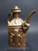 A 19thC embossed Indian copper kettle decorated with gods to each panel,