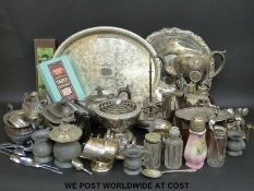 A quantity of plated items to include teapots, trays, cruets, cutlery,