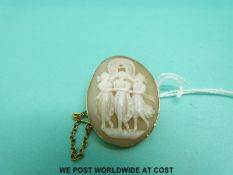 A 15ct gold cameo brooch depicting the three graces