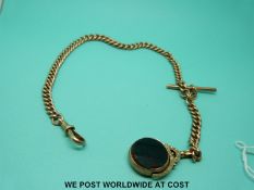 A hallmarked 9ct gold graduated Albert with a 9ct gold swivel fob set with a bloodstone and agate