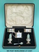 A cased hallmarked silver five-piece cruet set,