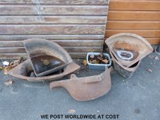 Four cast iron corner troughs.