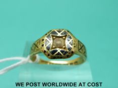 A Victorian 15ct gold ring decorated with enamel