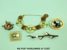 Two reverse painted brooches, one depicting a duck and the other Mizpah depicting a Scottie dog,