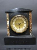 A black slate and marble single train mantel clock with Wurttemberg movement