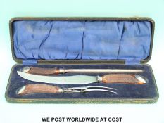 A hallmarked silver-mounted horn handled carving set in case,
