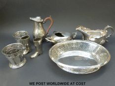 A quantity of silver plate to include a pair of Art Nouveau/Arts & Crafts beakers