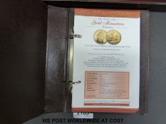 A gold miniatures coin collection in original presentation deluxe case with certificates,