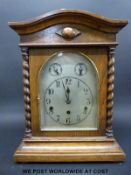 An oak cased mantel clock with three train movement by Kienzle no 113909,