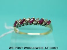 An 18ct gold ring set with baguette cut rubies and round cut diamonds (size V)