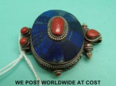 A Tibetan filigree prayer box set with lapis lazuli and coral
