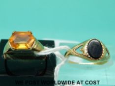 A 9ct gold ring set with a citrine (size M) and a 9ct gold ring set with onyx (size M)