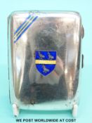 A hallmarked silver cigarette case with enamel heraldic decoration, height 8.