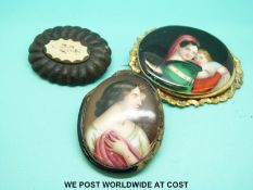A jet mourning brooch and two further brooches set with painted miniatures