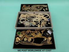 A bakelite necklace and bracelet, other bracelets, brooches, rings, necklace by Napier,