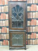 A 19th century oak astragal glazed floor standing corner cupboard (H202xW72cm)