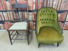A 19thC green upholstered nursing chair raised on ceramic castors and an upholstered oak framed