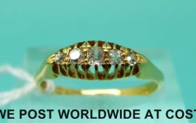 An 18ct gold ring set with five diamonds (size N)