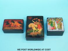 Three Russian signed hand-decorated hinged lacquer boxes (largest H12cm)