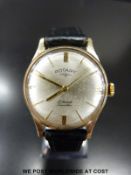 Rotary 9ct gold gentleman's wristwatch with baton markers and stainless steel face,