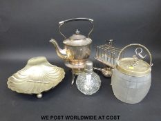 An Asprey of London heated toast rack together with a plated spirit kettle,