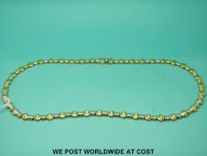 An 18ct bi coloured gold necklace set with diamonds (49.