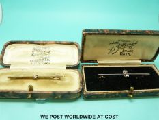 Two yellow metal bar brooches set with diamonds,