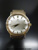 Omega Seamaster 9ct gold gentleman's wristwatch with two tone hands and baton markers,