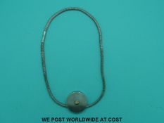 Andrew Scott silver necklace set with a diamond.