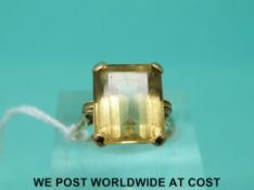 A 9ct gold ring set with a emerald cut citrine (size L)