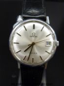 Omega gentleman's wristwatch with date aperture and gold and black hands and markers,